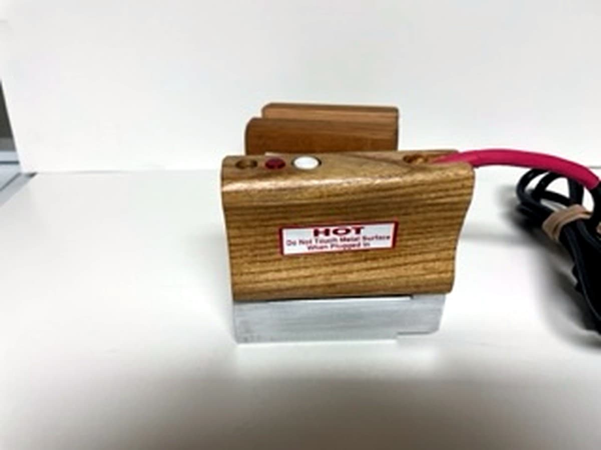 MM 5M four inch cube bar iron with its aluminum stamping bar and thermostat indicator light