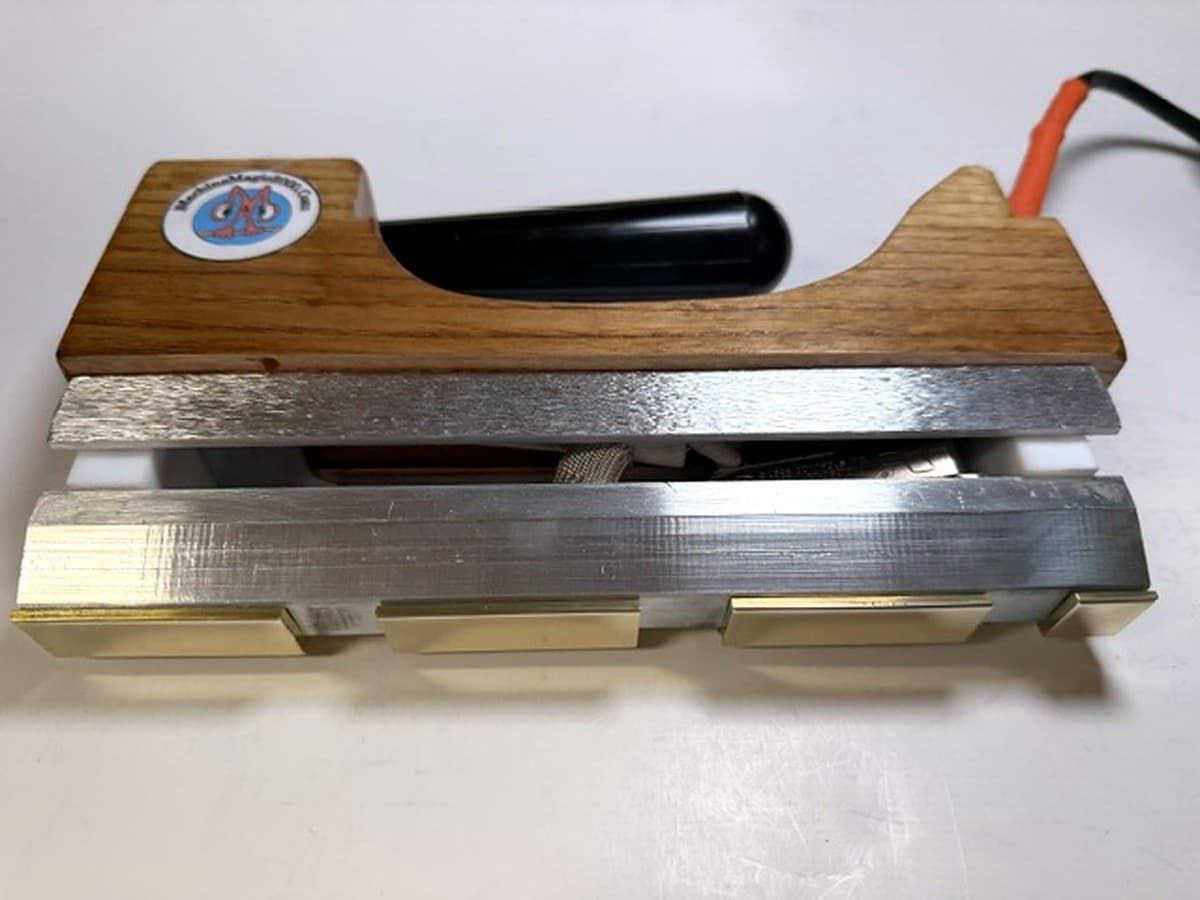 MM 9DLXCW Deluxe Camel Wides iron with its polished brass stamping bar and no rear power switch